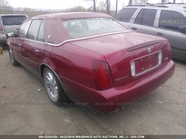 1G6KF57901U168176 - 2001 CADILLAC DEVILLE DTS RED photo 3