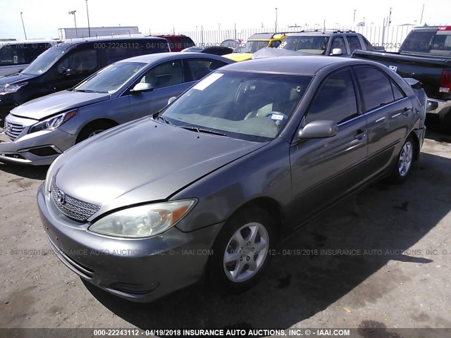 4T1BE32K33U674047 - 2003 TOYOTA CAMRY LE/XLE/SE ოქროსფერი ფოტო 2