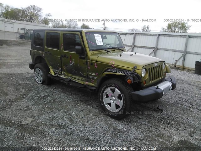 1J4BA5H1XAL210650 - 2010 JEEP WRANGLER UNLIMITE SAHARA GREEN photo 1