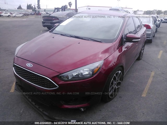 1FADP3H29HL284703 - 2017 FORD FOCUS SEL RED photo 2