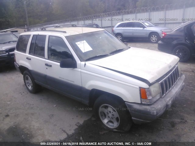 1J4GZ58S1VC566952 - 1997 JEEP GRAND CHEROKEE LAREDO/TSI WHITE photo 1