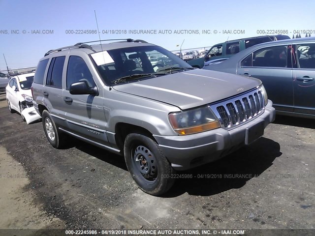 1J4GW48S71C634751 - 2001 JEEP GRAND CHEROKEE LAREDO GRAY photo 1