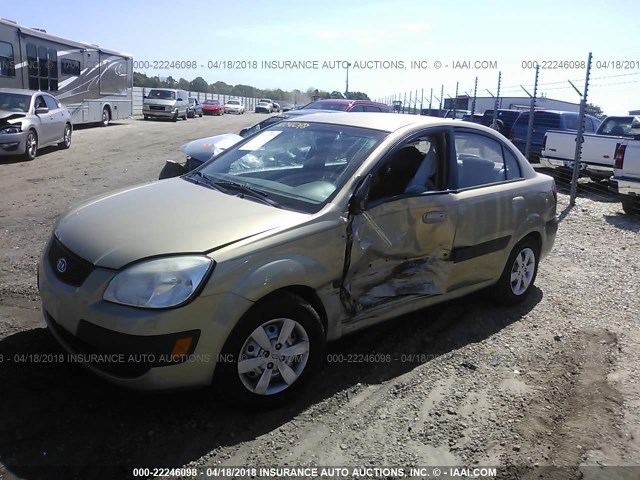 KNADE223596519137 - 2009 KIA RIO LX/SX GOLD photo 2