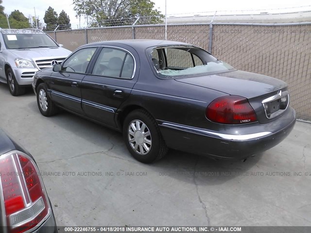 1LNHM97V7XY704829 - 1999 LINCOLN CONTINENTAL  GRAY photo 3