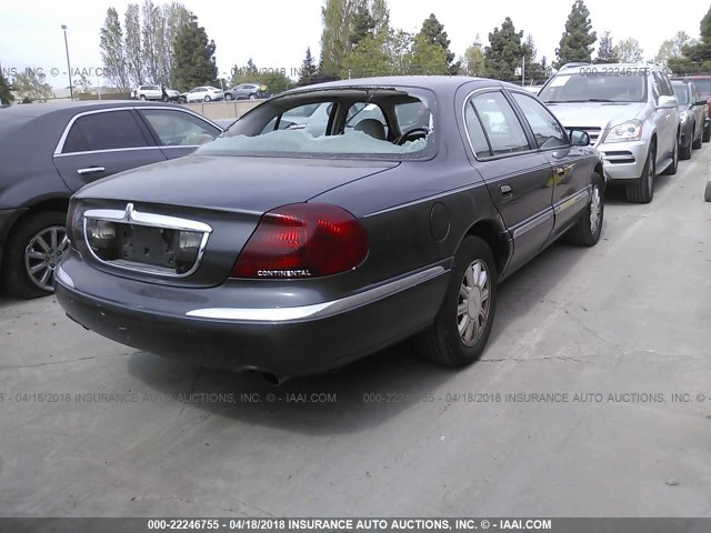 1LNHM97V7XY704829 - 1999 LINCOLN CONTINENTAL  GRAY photo 4