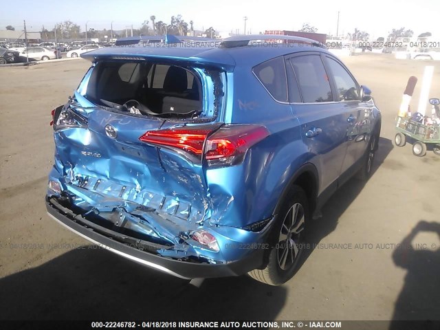 2T3WFREV3GW265924 - 2016 TOYOTA RAV4 XLE Light Blue photo 4