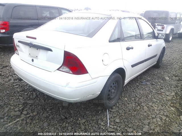 1FAFP33P12W301589 - 2002 FORD FOCUS LX WHITE photo 4