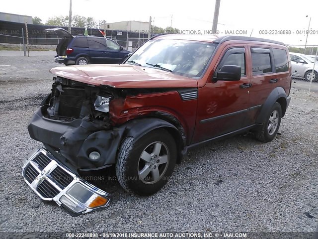 1D8GT28K37W610703 - 2007 DODGE NITRO SXT ORANGE photo 2