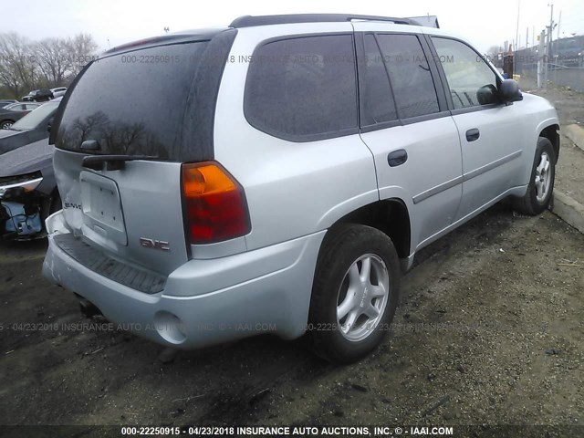 1GKDS13S972291647 - 2007 GMC ENVOY SILVER photo 4