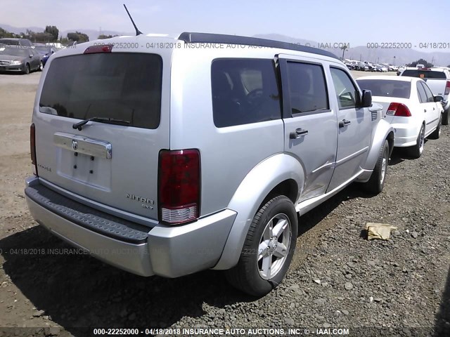 1D4PT5GK0BW573980 - 2011 DODGE NITRO SXT SILVER photo 4