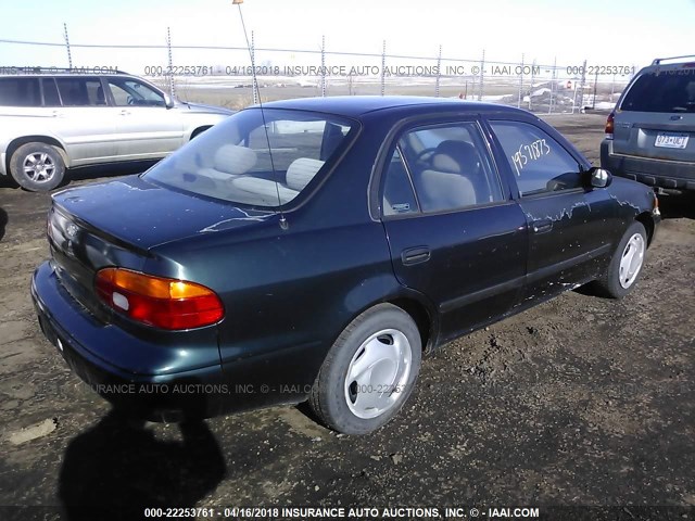 1Y1SK5282WZ423102 - 1998 CHEVROLET GEO PRIZM LSI GREEN photo 4