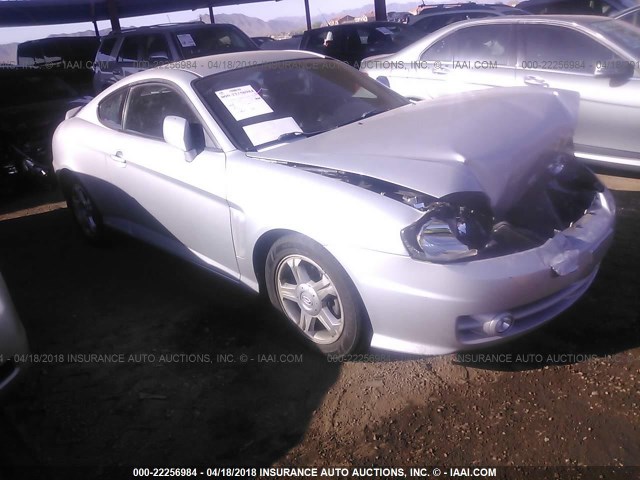 KMHHM65D04U121918 - 2004 HYUNDAI TIBURON SILVER photo 1