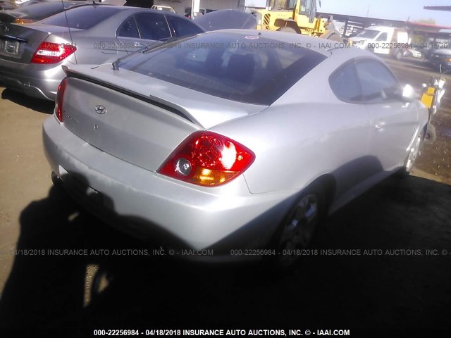 KMHHM65D04U121918 - 2004 HYUNDAI TIBURON SILVER photo 4