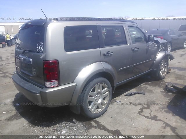 1D8GT58K77W723586 - 2007 DODGE NITRO SLT GOLD photo 4