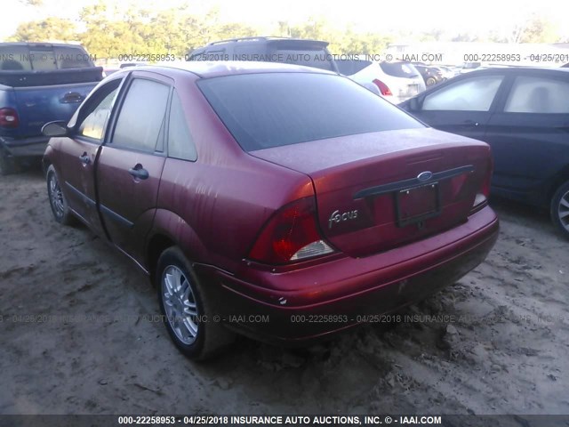 1FAFP33P24W120617 - 2004 FORD FOCUS LX RED photo 3