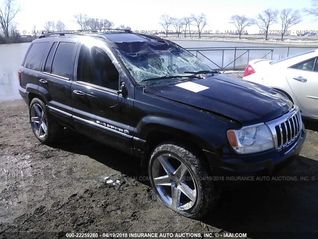 1J8GW68J04C253703 - 2004 JEEP GRAND CHEROKEE OVERLAND BLACK photo 1