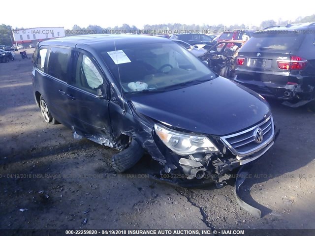 2V8HW34109R518476 - 2009 VOLKSWAGEN ROUTAN SE BLUE photo 1