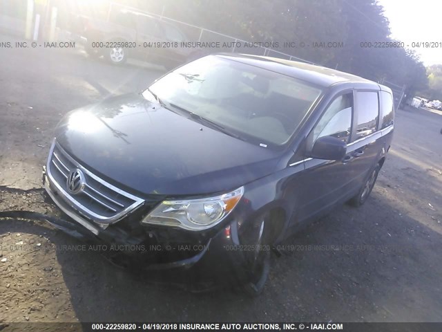 2V8HW34109R518476 - 2009 VOLKSWAGEN ROUTAN SE BLUE photo 2