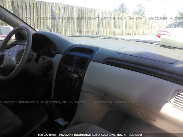 2T1CF22P11C449230 - 2001 TOYOTA CAMRY SOLARA SE/SLE თეთრი ფოტო 5