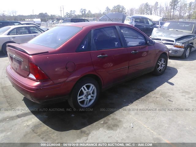 1FAFP3439YW268295 - 2000 FORD FOCUS SE/SE SPORT RED photo 4