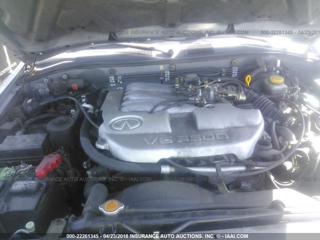 JNRDR07Y31W109585 - 2001 INFINITI QX4 SILVER photo 10