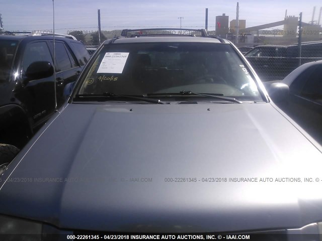 JNRDR07Y31W109585 - 2001 INFINITI QX4 SILVER photo 6