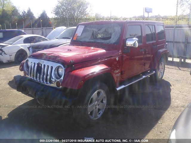 1J4BA5H10BL558099 - 2011 JEEP WRANGLER UNLIMITE SAHARA RED photo 2