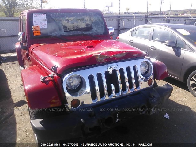 1J4BA5H10BL558099 - 2011 JEEP WRANGLER UNLIMITE SAHARA RED photo 6