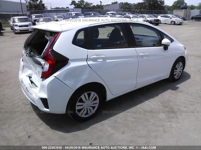 JHMGK5H59GX035643 - 2016 HONDA FIT LX WHITE photo 4