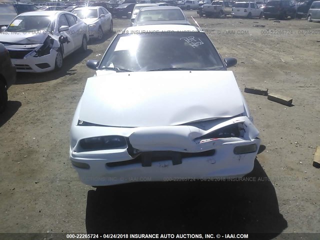 J81RF2366N7526550 - 1992 GEO STORM 2+2 თეთრი ფოტო 6