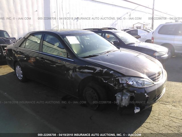 JTDBE30K920028542 - 2002 TOYOTA CAMRY LE/XLE/SE იასამნისფერი ფოტო 1