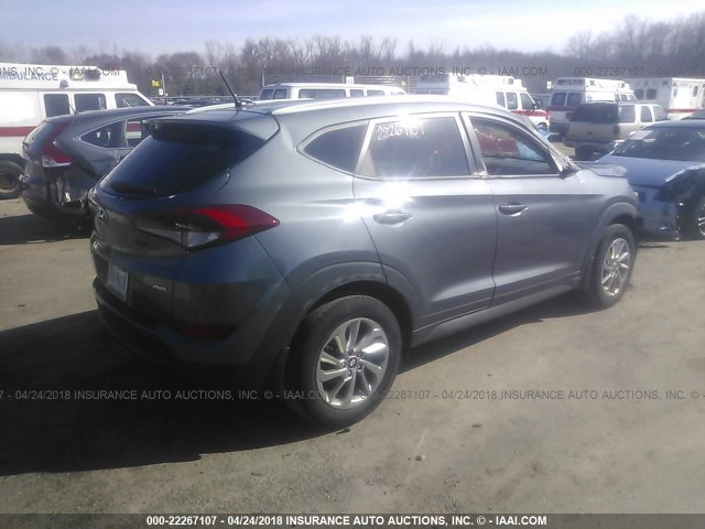 KM8J3CA42GU180904 - 2016 HYUNDAI TUCSON LIMITED/SPORT AND ECO/SE GRAY photo 4