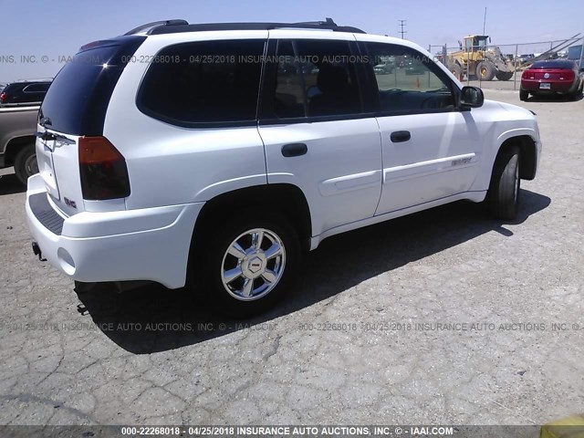 1GKDT13S242180821 - 2004 GMC ENVOY WHITE photo 4