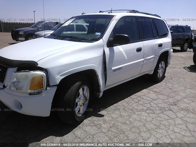 1GKDT13S242180821 - 2004 GMC ENVOY WHITE photo 6