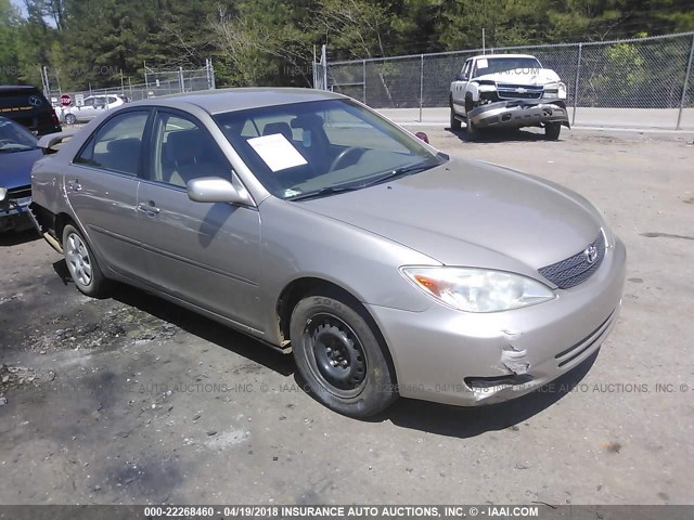 JTDBE32K840264955 - 2004 TOYOTA CAMRY LE/XLE GOLD photo 1