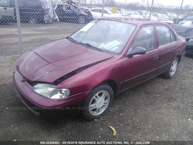 1Y1SK5288YZ421714 - 2000 CHEVROLET GEO PRIZM LSI RED photo 2