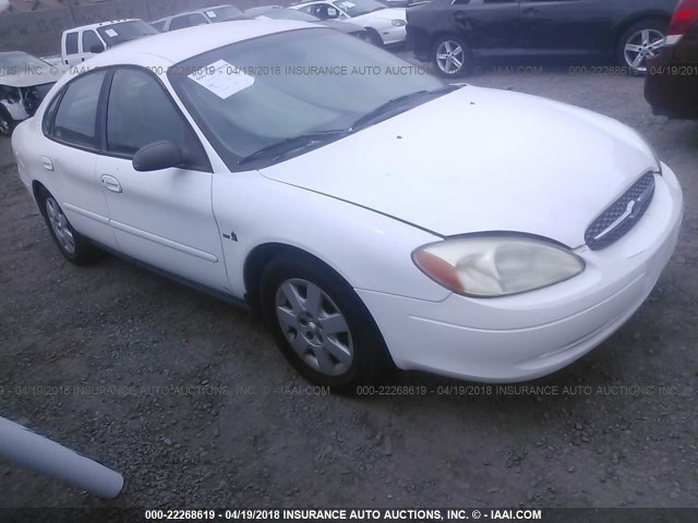 1FAFP5220YA197328 - 2000 FORD TAURUS LX WHITE photo 1