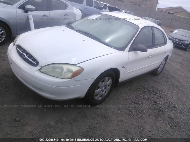 1FAFP5220YA197328 - 2000 FORD TAURUS LX WHITE photo 2