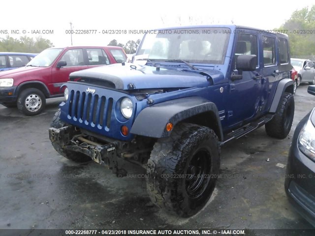 1J4BA3H1XAL171417 - 2010 JEEP WRANGLER UNLIMITE SPORT BLUE photo 2