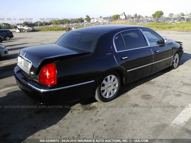 1LNHM84W84Y647172 - 2004 LINCOLN TOWN CAR EXECUTIVE L BLACK photo 4