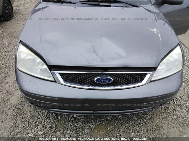 1FAHP34N17W252424 - 2007 FORD FOCUS ZX4/S/SE/SES GRAY photo 6