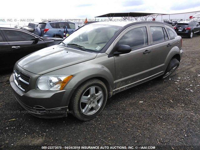 1B3HB48B28D695677 - 2008 DODGE CALIBER SXT TAN photo 2