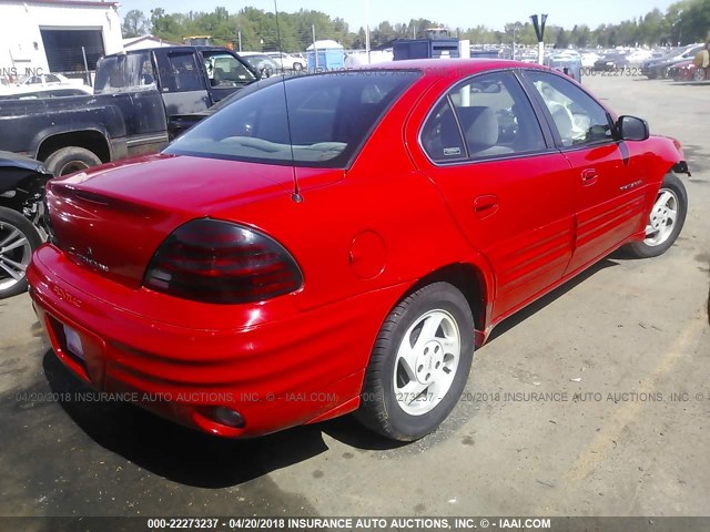 1G2NE52E6XM786536 - 1999 PONTIAC GRAND AM SE RED photo 4