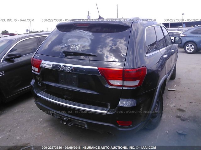 1J4RS6GT8BC611572 - 2011 JEEP GRAND CHEROKEE OVERLAND BLACK photo 4