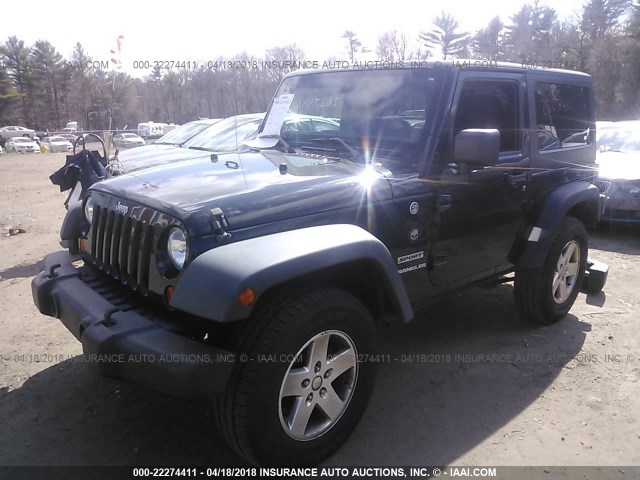 1J4AA2D13BL542494 - 2011 JEEP WRANGLER SPORT BLACK photo 2