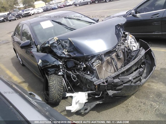 4T1BF1FK2EU433370 - 2014 TOYOTA CAMRY L/SE/LE/XLE მუქი ლურჯი ფოტო 1