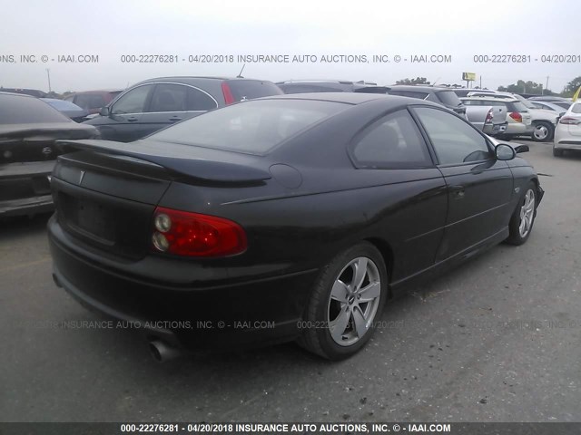 6G2VX12U05L426825 - 2005 PONTIAC GTO BLACK photo 4