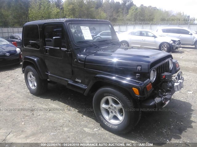 1J4FA59SX1P318820 - 2001 JEEP WRANGLER / TJ SAHARA BLACK photo 1