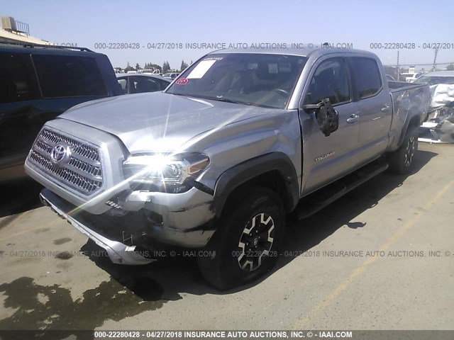 3TMDZ5BN5GM012150 - 2016 TOYOTA TACOMA DBL CAB/SR5/TRD SPORT/OR SILVER photo 2