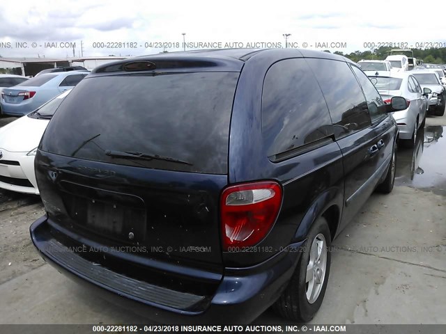 1D4GP45R06B583534 - 2006 DODGE CARAVAN SXT BLUE photo 4